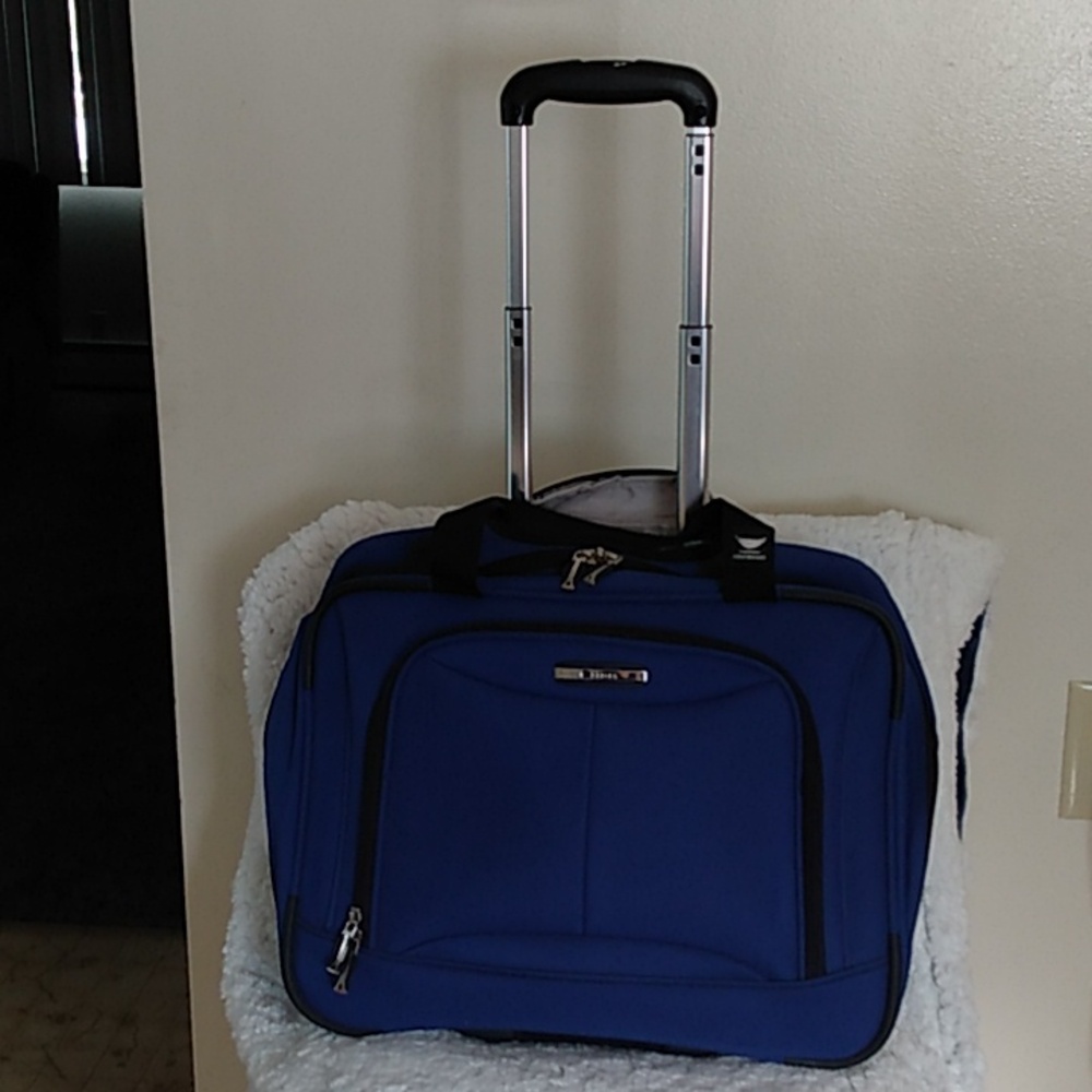 DELSEY TRAVEL BAG WITH TELESCOPING HANDLE
